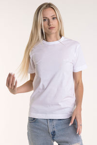 blonde female odel wearing a white boxy tee