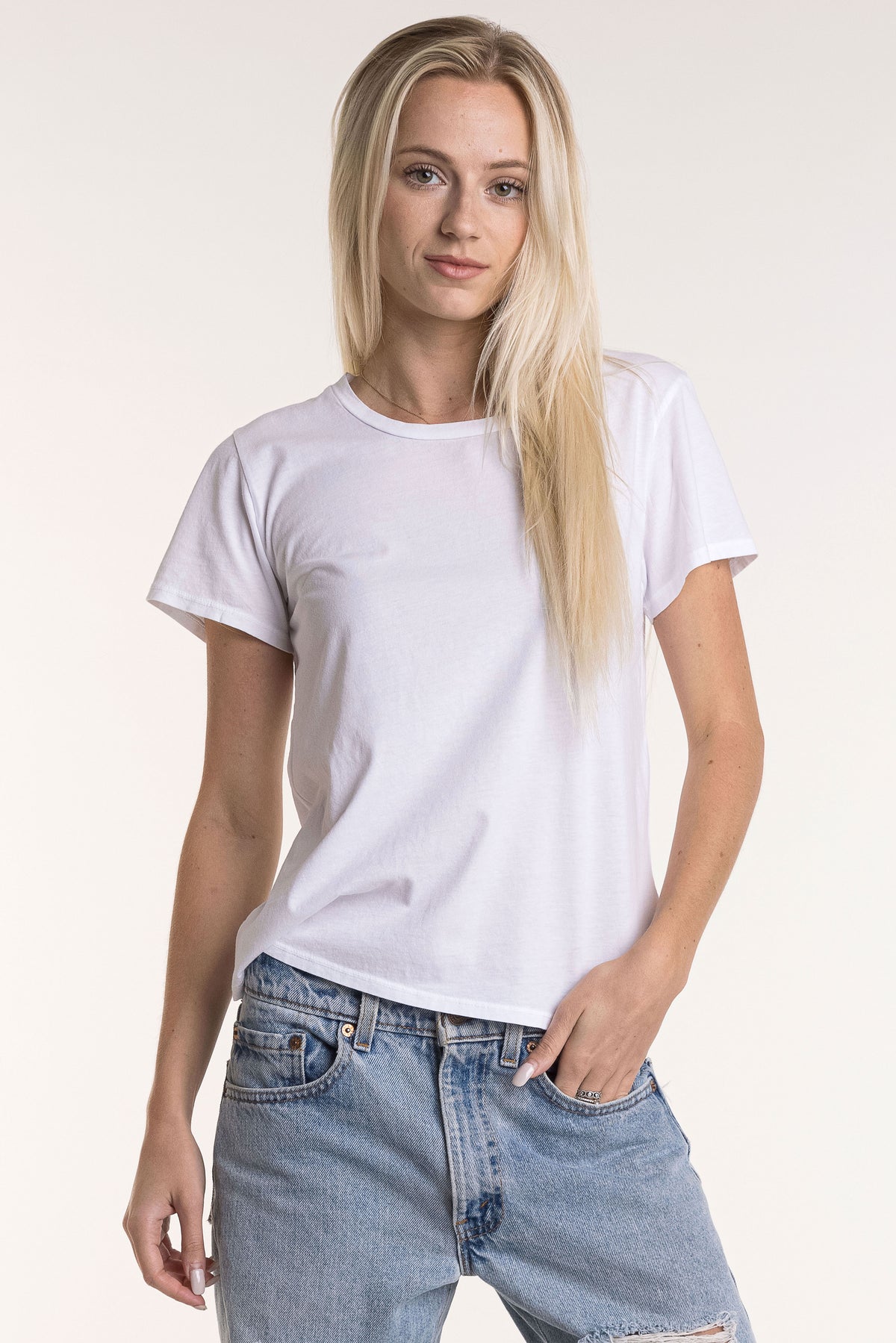 Blond female model wearing a white t-shirt